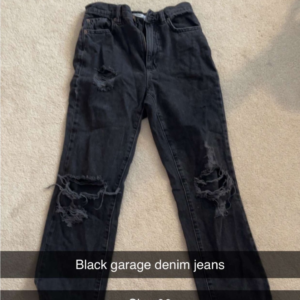 Black garage ripped jeans